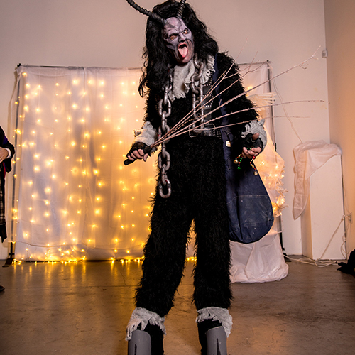 krampus actor making an ugly face