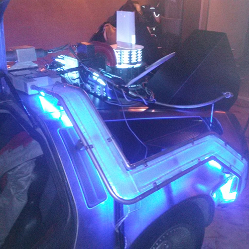 life sized delorean prop with doors open rear view