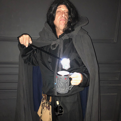 wizard with wand and mug